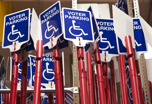 Disabled voter parking signs are stored inside the Maricopa County Elections Department warehouse in Phoenix. The signs provide access for disabled voters at polling locations in Maricopa County. Photo by Jeremy Knop/News21