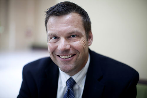 Kansas Secretary of State Kris Kobach is a national leader in the effort to enact strict voter registration requirements. He has has used his office to endorse statewide and federal GOP candidates, but is best known for writing S.B. 1070, the controversial Arizona immigration law. Photo by Lizzie Chen/News21